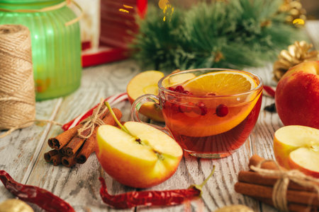 Beautiful composition with glint wine cup and ingridients on wooden tableの写真素材