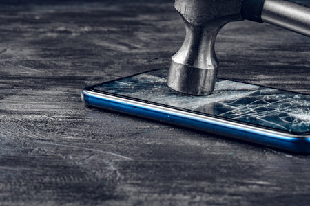 Digital gadget with tools. Repairing smartphone conceptの写真素材