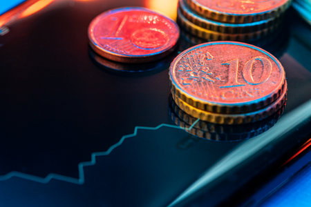 Euro coin on stock chart. Financial investment concept.