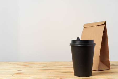 Paper bags with take away food and coffee cups containersの写真素材