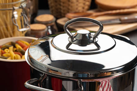 Cooking pasta at home in a pot close upの写真素材