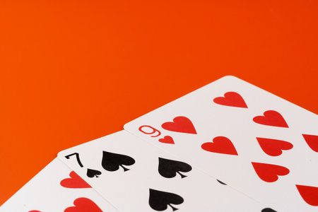 Playing cards on paper background close upの写真素材