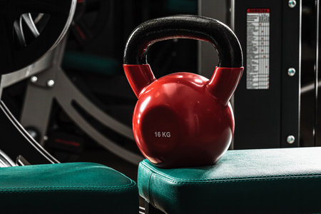 Sports equipment in gym. Dumbbells of different weight close upの写真素材