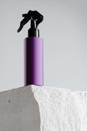 Cosmetic jar on gray cinder block close upの写真素材