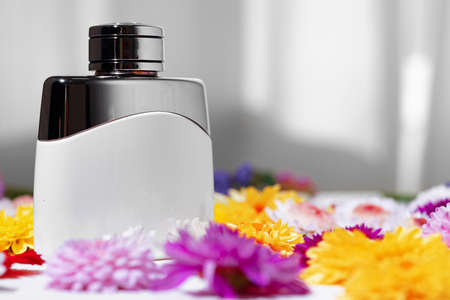 Perfume bottle for women in flower budsの写真素材