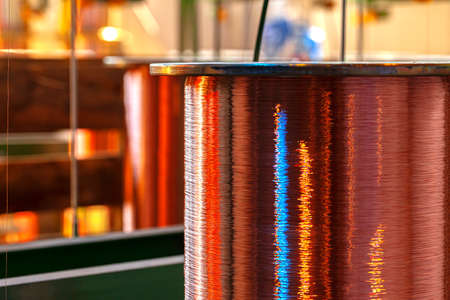 Copper wire reels in cable factory close up