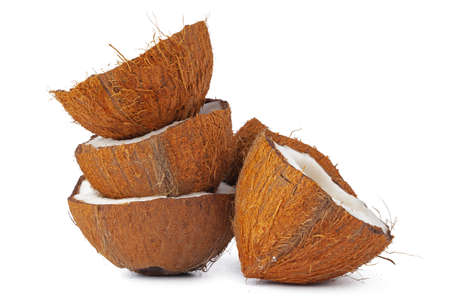 Pieces of a coconut on white backgroundの写真素材