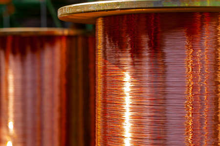 Copper wire reels in cable factory close up