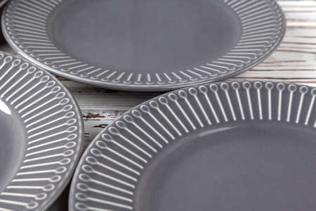 Wooden kitchen counter with new dishware on itの写真素材