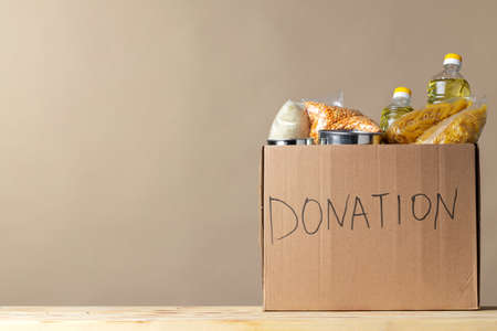 Donation box with various food. Pandemic support.
