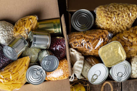 Food donations on the table. Text Donation.の写真素材