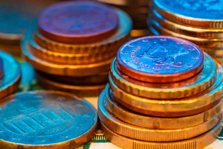 Close up photo of coins stacked on each other