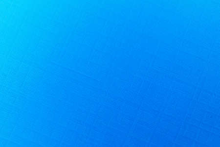 Blank carton paper sheets background in dark blue light