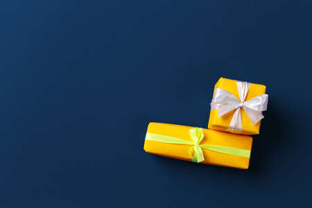 Gift box on classic blue background top viewの写真素材