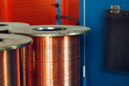 Copper wire reels in cable factory close upの写真素材