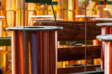 Copper wire reels in cable factory close up