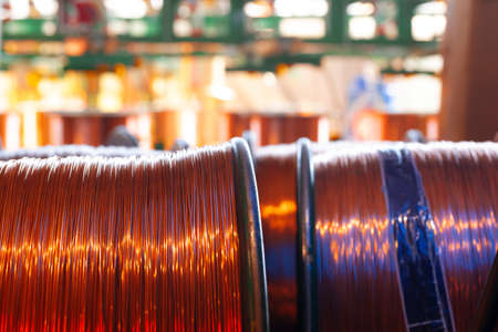 Copper wire reels in cable factory close upの写真素材