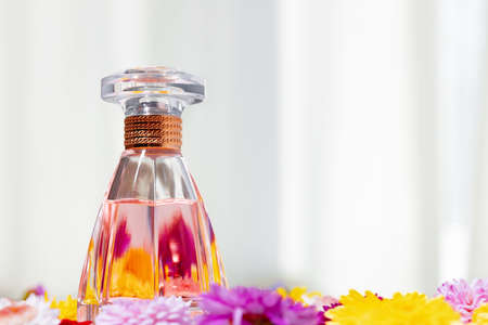 Perfume bottle for women in flower budsの写真素材