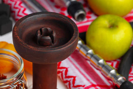 Empty hookah shaft close up on table with fresh fruit