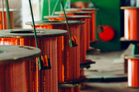 Copper wire reels in cable factory close upの写真素材
