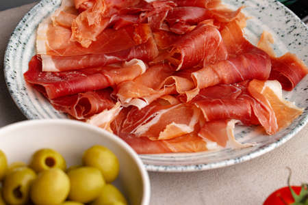Delicious meat slicing on plate close up