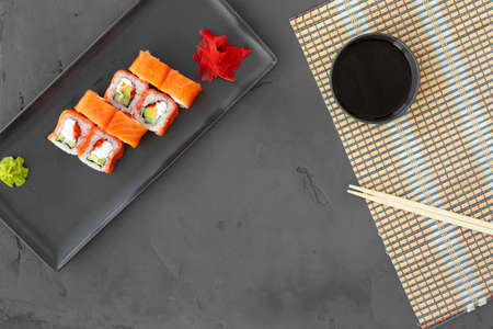 Philadelphia sushi roll on black background top viewの写真素材