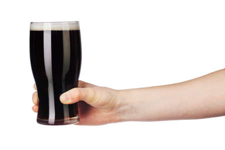 Hand with full beer glass isolated on white background