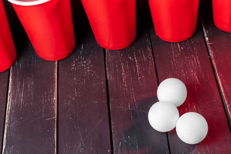 Cups for game Beer Pong on the tableの写真素材