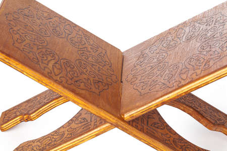 wooden book stand over white backgroundの写真素材