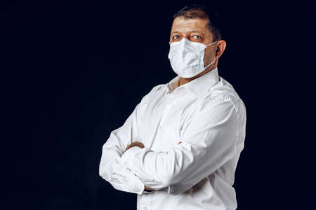 Portrait of a sick adult man in medical mask. Coronavirus pandemia conceptの写真素材