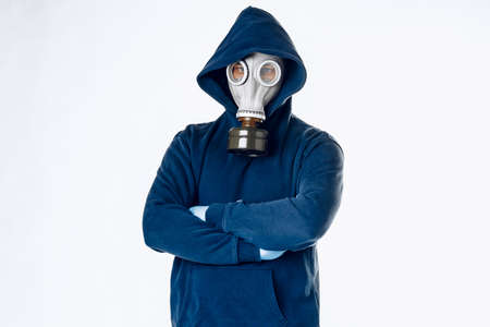 Portrait of a man in a gas mask. Panic during quarantine. Coronavirus pandemia
