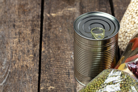 Donations food with canned food on the table background. Donate concept.の写真素材
