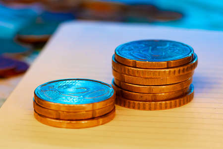 Close up of coins stacked on each otherの写真素材