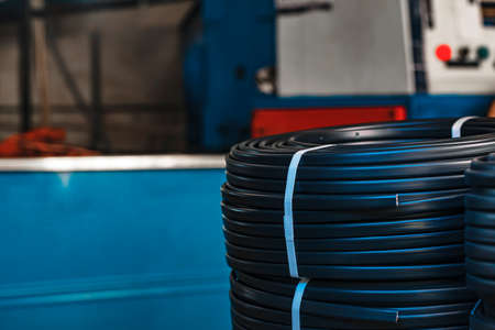 Set of black electric cable reels close up