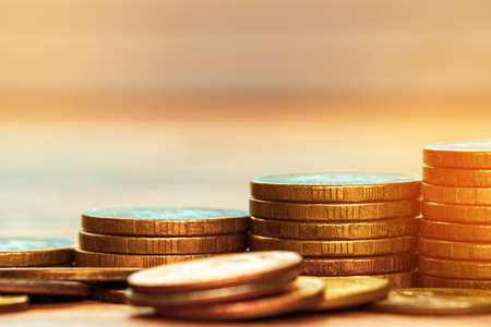 Close up of coins stacked on each otherの写真素材
