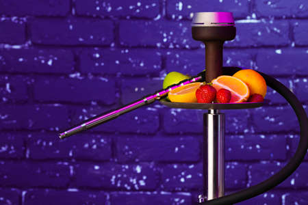 Shisha parts and fresh fruits close up