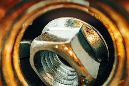 Metal nut on black background close upの写真素材