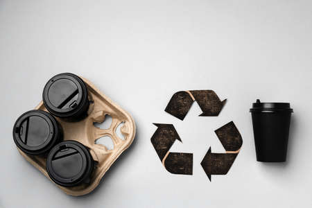 Recycle takeout coffee cups and trays ecological conceptの写真素材