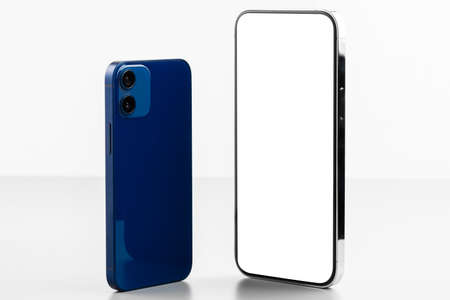 Two modern mobile phone mockup, front and back sides, gray backgroundの写真素材