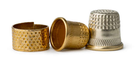 Metal sewing thimble isolated on whiteの写真素材
