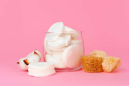 Cotton discs for skincare in a jar on paper backgroundの写真素材