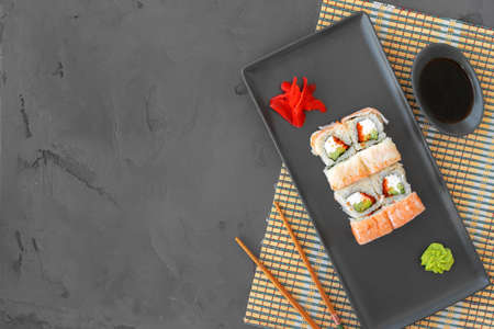 Sushi roll with shrimp on gray background top viewの写真素材
