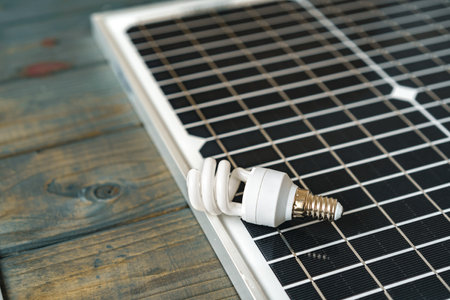 Solar energy panel and light bulb, green energyの写真素材