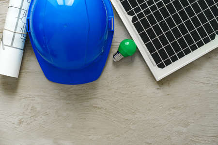 Blueprint roll and solar panel, home project