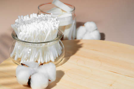 Hygienic cotton ear buds in glass cupの写真素材