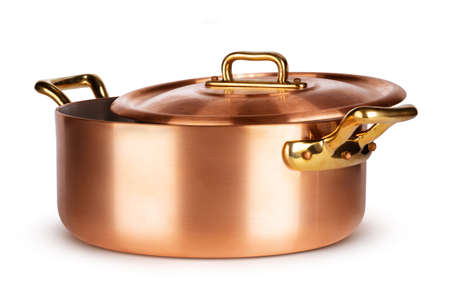 Copper cookware set isolated on white backgroundの写真素材