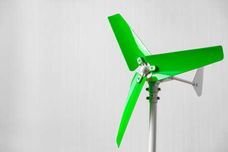 Plastic windmill model propeller indoors close up
