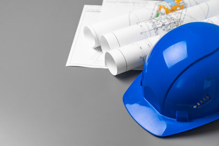Architectural construction plans paper on table close upの写真素材