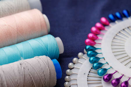 Close up of sewing accessories on tableの写真素材