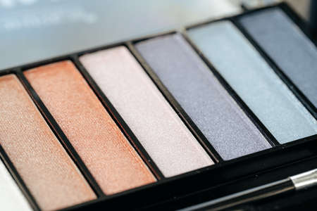Set of eye shadows on grey background